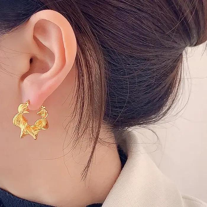 Boucles d'oreilles créoles géométriques torsadées en argent Sterling 925 pour femme élégantes et légères pour tous les jours