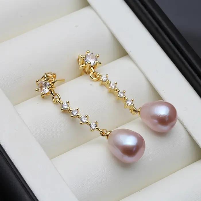 Bijoux de boucle d'oreille de perle de femme moderne