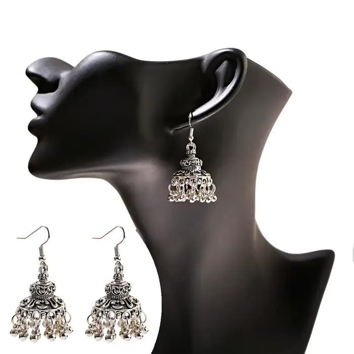 Boucles d'oreilles tibétaines vintage couleur argent avec cloches et motifs floraux pour femmes occasions spéciales bohèmes