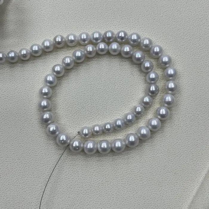 Perles naturelles 8-9mm AAAA rondes lisses d'eau douce blanches