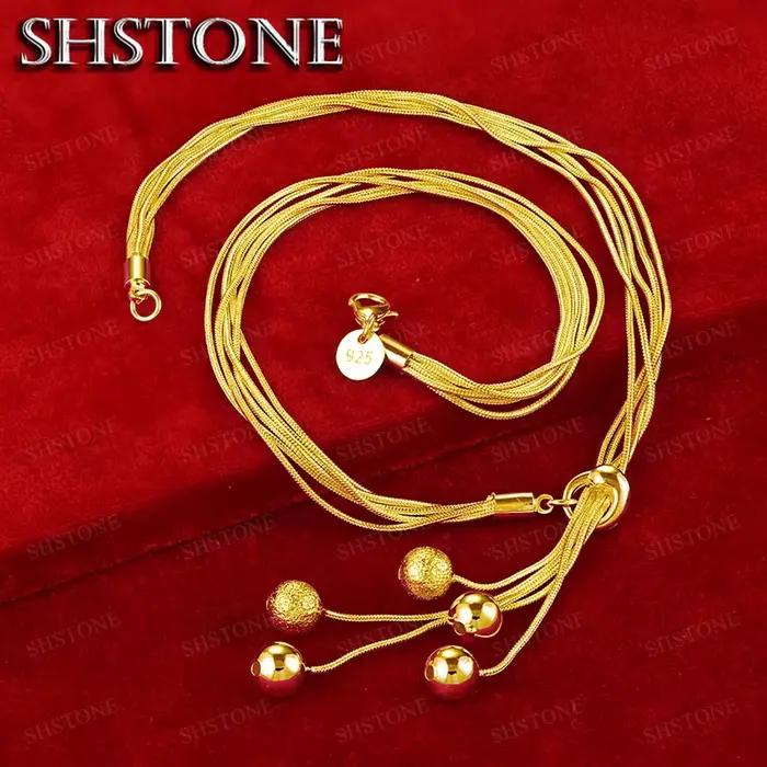 Collier en or 18 carats avec pendentif à cinq perles lisses givrées