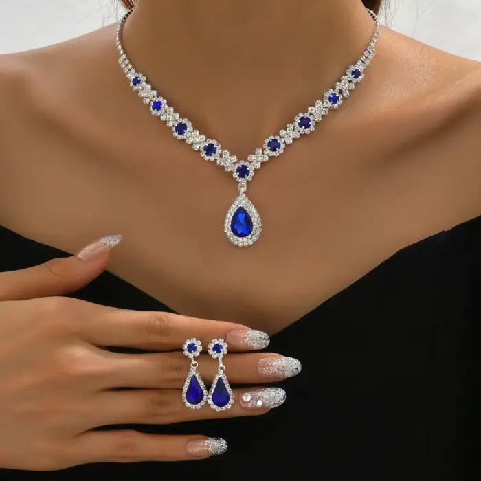 Ensemble de bijoux en cristal plaqué or plaqué argent plaqué rhodium avec boucles d'oreilles pendantes en zircon pour femmes occasions de soirée élégantes