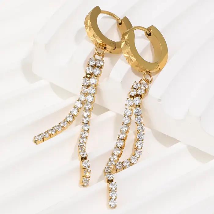 E.B.belle Boucles d'oreilles créoles à fermoir avec longues pampilles en zircon et petite fleur