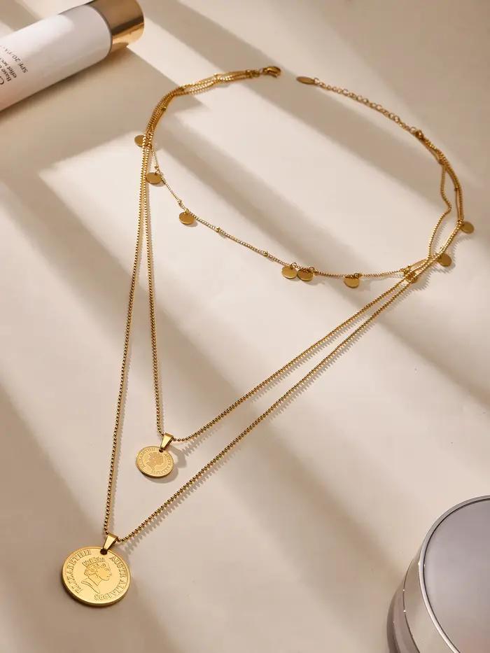 Collier long pour femme en acier inoxydable plaqué or avec pendentif rond motif portrait de reine et pompon bijou de luxe pour banquet et anniversaire