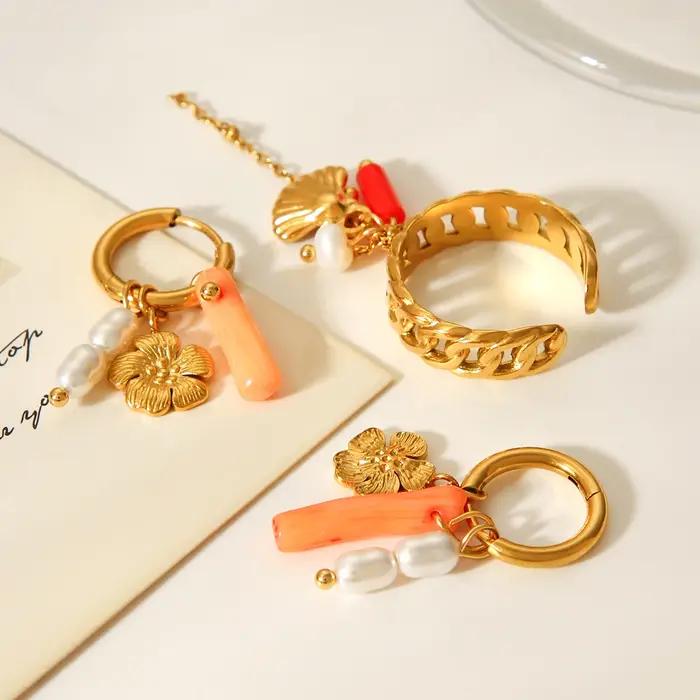 Ensemble de boucles d'oreilles et bagues en perles florales