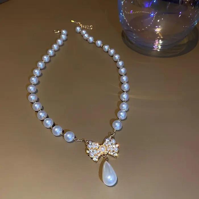 Collier Nœud Papillon en Perles et Strass pour Femme