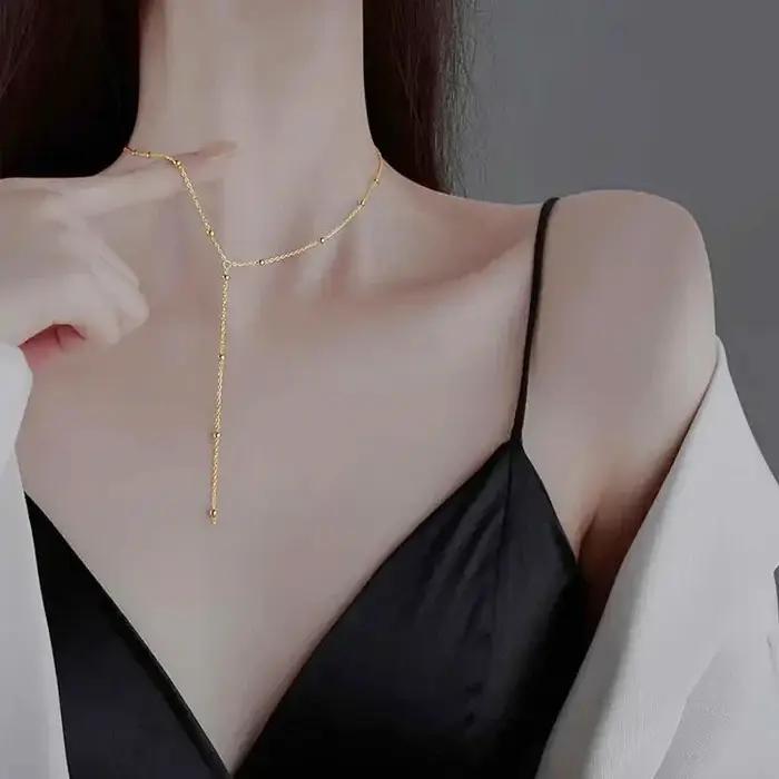 Collier à double couche avec pampilles géométriques pour femmes élégantes occasions spéciales style bohème romantique