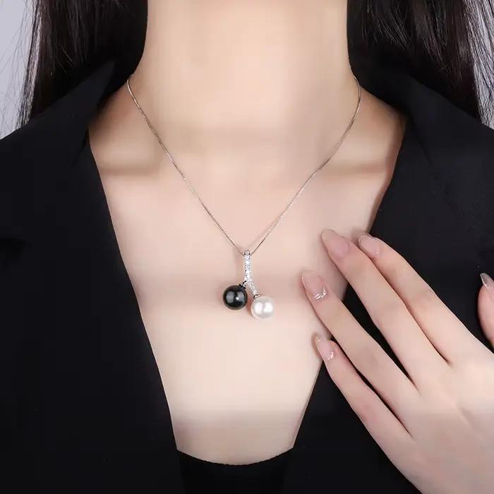 Collier pendentif perle de Tahiti fritillaire vintage pour femme