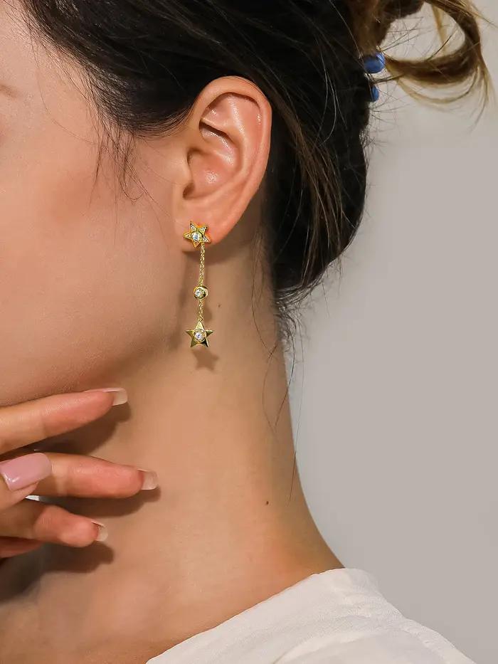 Boucles d'oreilles pendantes longues avec pompon étoile pour femme