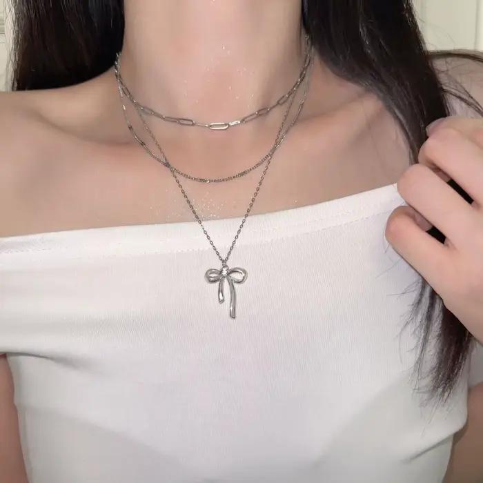 Collier pendentif Chic avec nœud papillon pour femmes, accessoire d'été de Style doux et Cool, chaîne de clavicule pour filles à la mode