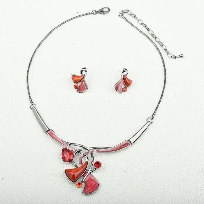 Ensemble de bijoux ICEYY en résine plaquée or pour femmes - Collier et boucles d'oreilles goutte d'eau pour occasions spéciales