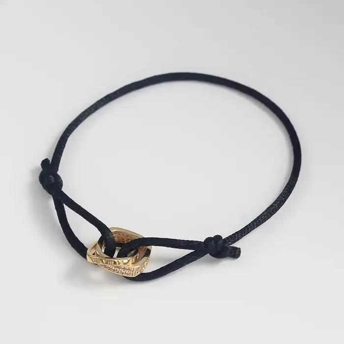 Bracelet en corde réglable avec chiffres interblocés en acier inoxydable pour homme et femme occasions spéciales