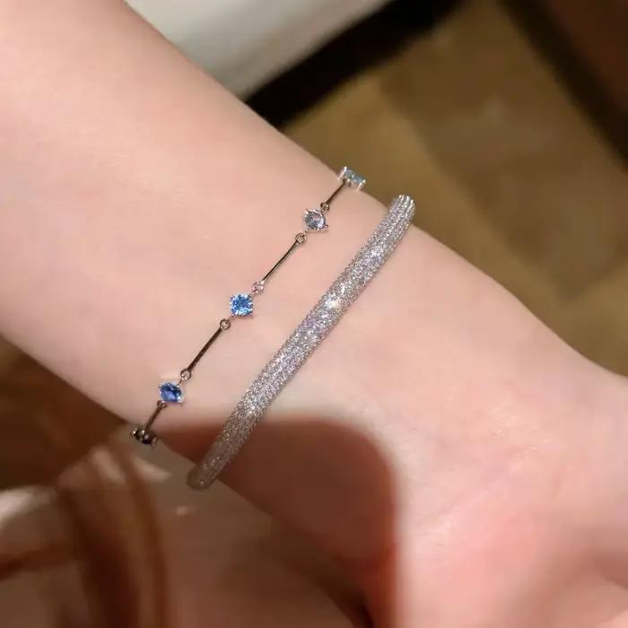 Bracelets haut de gamme en diamants bleus frais pour femmes, avec longue chaîne brillante, design minimaliste, accessoires de bijoux de fête