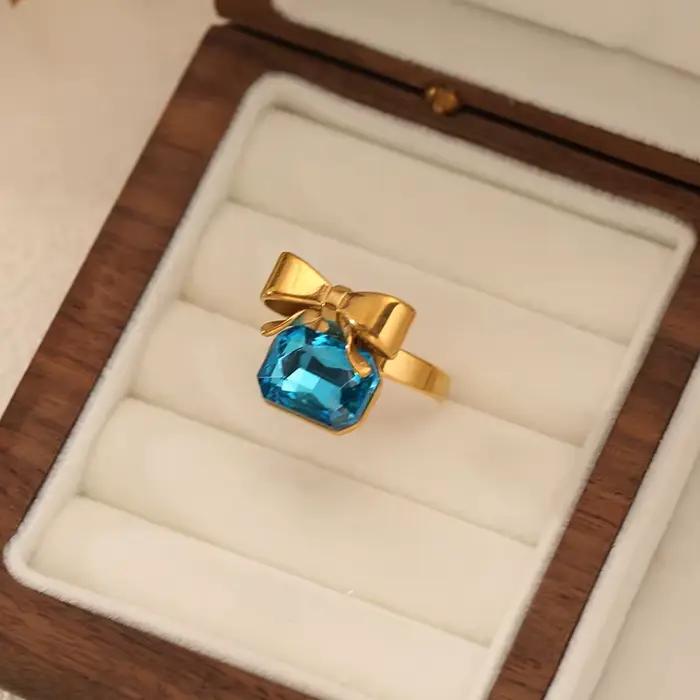 Bijoux Élégants EILIECK - Ensemble Collier Carré à Nœud Papillon, Boucles d'Oreilles, Bague et Bracelet pour Femmes Occasions Spéciales