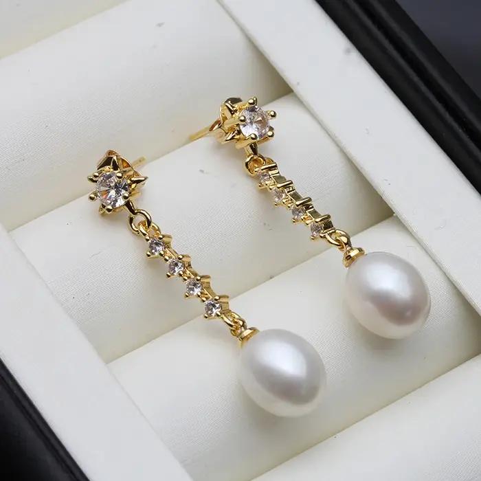 Bijoux de boucle d'oreille de perle de femme moderne