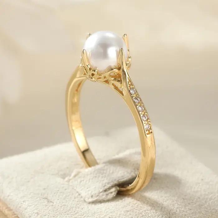Bague dorée élégante de style bohème avec imitation de perles pour femmes