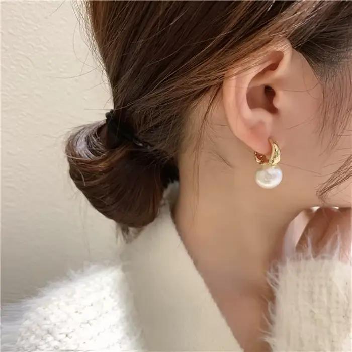 Boucles d'oreilles pendantes en perles de Champagne