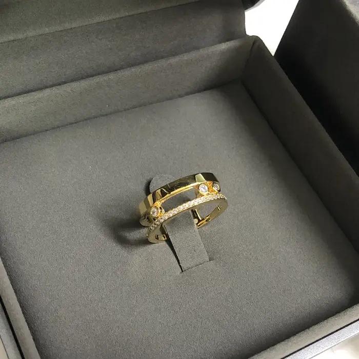 Bague de marque réputée, haute qualité, trois diamants coulissants