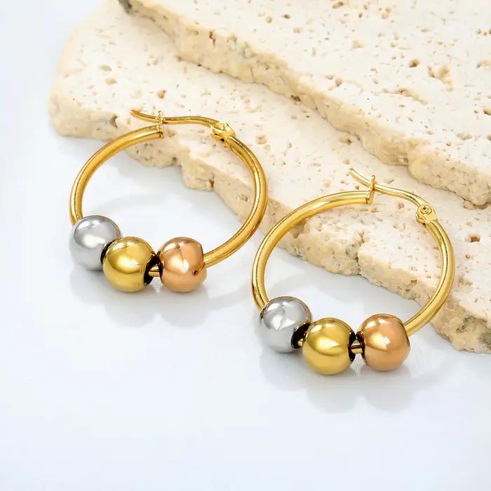 Boucles d'oreilles créoles Huggie à trois billes bicolores Or et Argent en Acier Inoxydable 316L