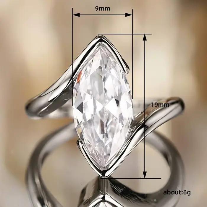 Huitan – bague en forme de marquise pour femmes, couleur argent/or, incrustée de CZ brillant, accessoires de mode pour fête de mariage, bijoux polyvalents
