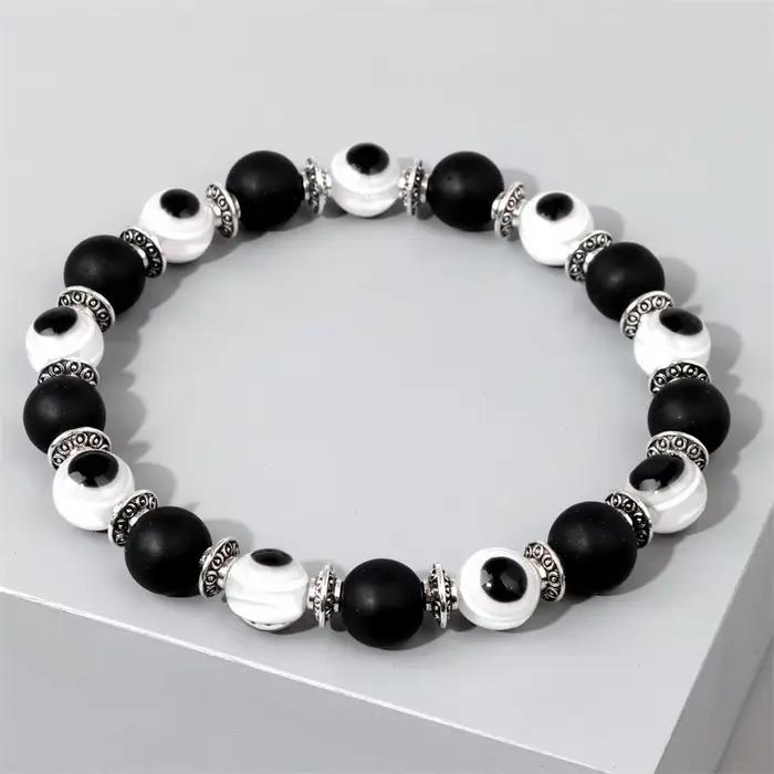 Bracelets mauvais œil colorés faits à la main pour hommes et femmes, bracelets perlés, bijoux élastiques, jaune, rose, noir, bleu, vert, mode