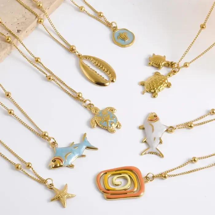 Collier marin en acier inoxydable plaqué or véritable avec perles et pendentifs coquillage