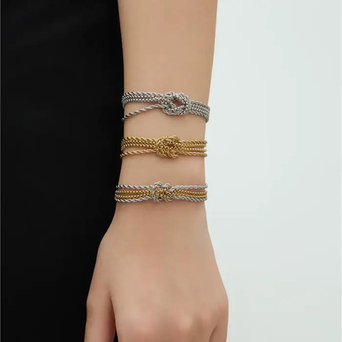 Bracelet à nœud d'amour en acier inoxydable pour femmes