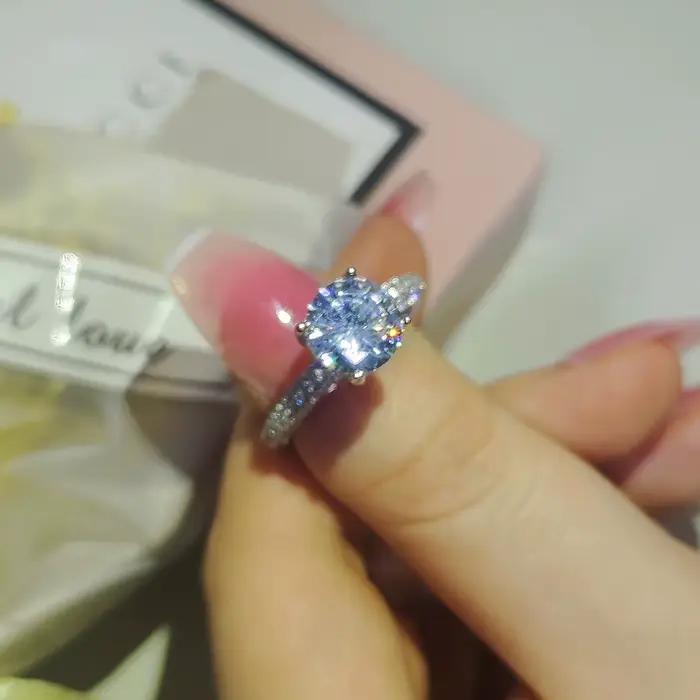 Bague de fiançailles en argent sterling 925 sertie de zirconium blanc élégante pour célébrer l'engagement et les occasions spéciales pour femme