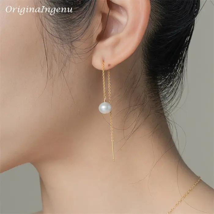 Boucles d'oreilles pendantes faites à la main pour femmes