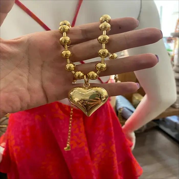 Collier pendentif coeur doré gothique pour femme
