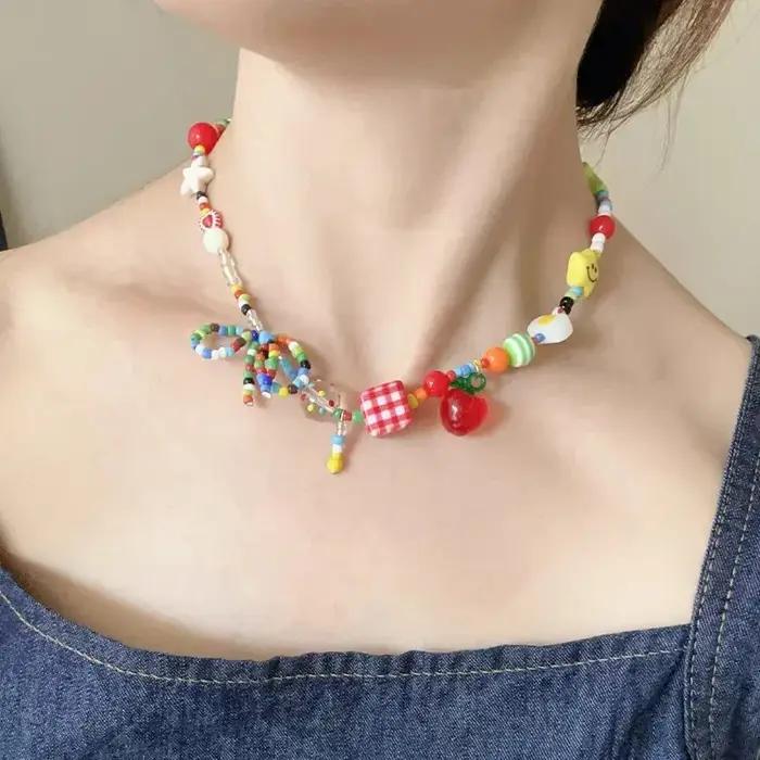 Collier ras du cou avec nœud de fruits de pomme