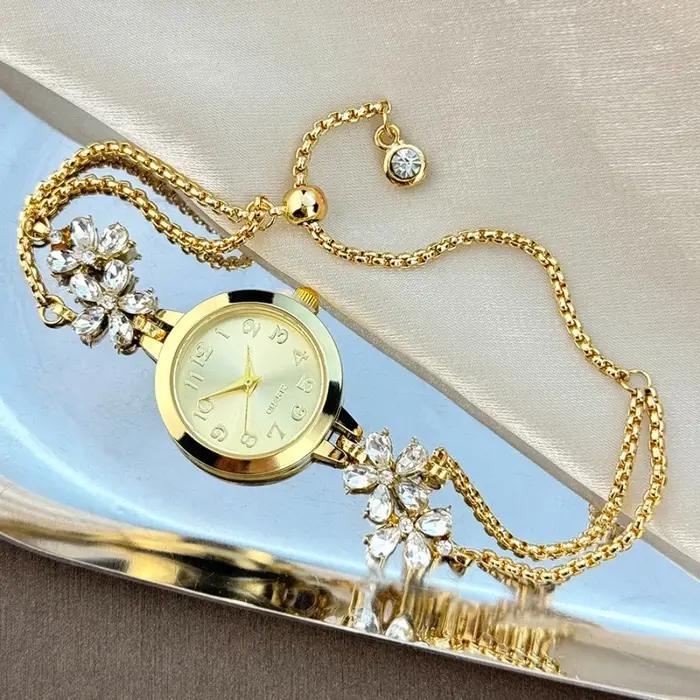 Montre-bracelet femme élégante à quartz avec motif fleurs boîtier métal et boucle bijoux pour style luxe affaires et sport
