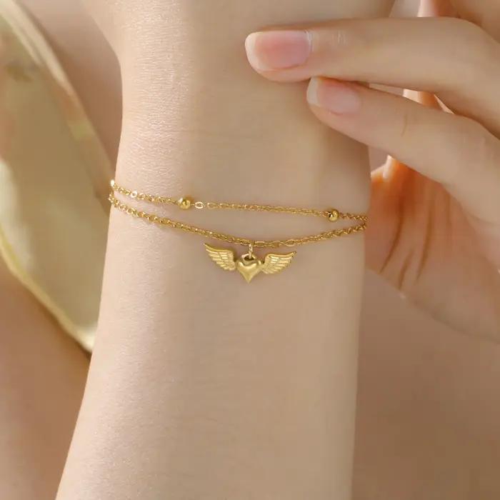 Teamer – Bracelet à breloques en forme d'aile de cœur pour femmes