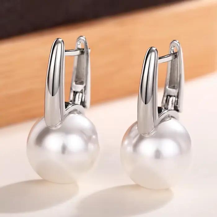 Huitan – boucles d'oreilles simples et élégantes en Imitation de perles pour femmes, couleur métal argent, mode polyvalente, accessoires d'oreille pour dames, nouveaux bijoux