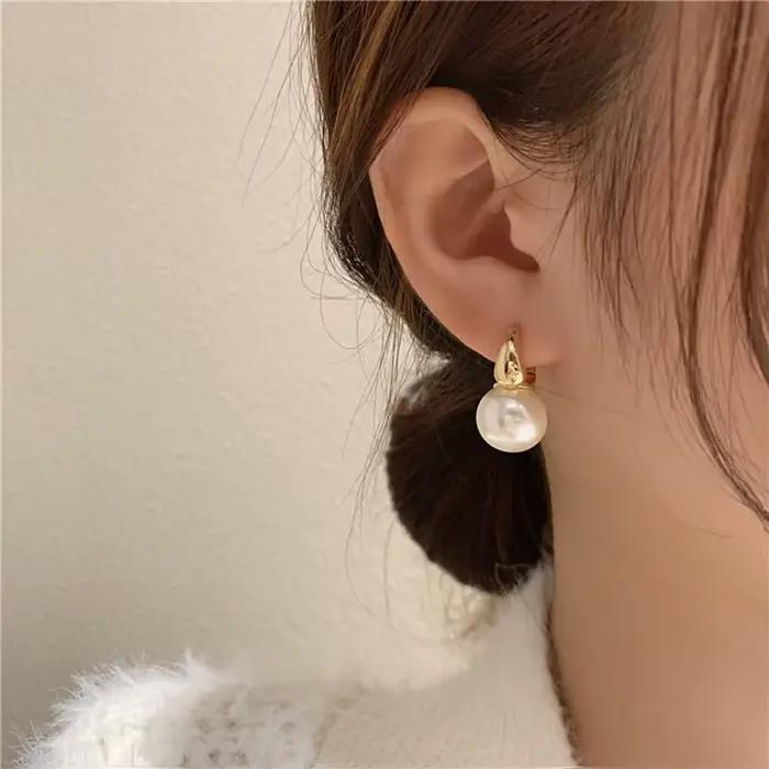 Boucles d'oreilles pendantes en perles de Champagne