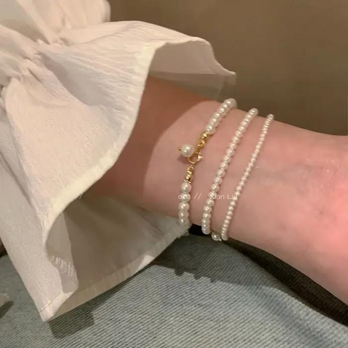 Bracelet à breloques en perles dorées style mignon romantique pour femmes occassions spéciales soirée party accessorise minimaliste élégant