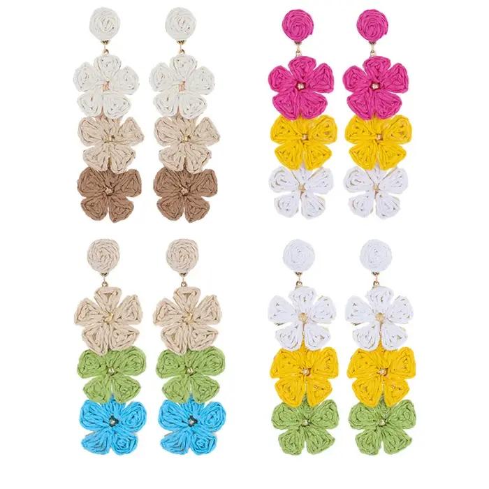 Boucles d'oreilles pendantes en forme de fleur enveloppée de paille en raphia pour femmes