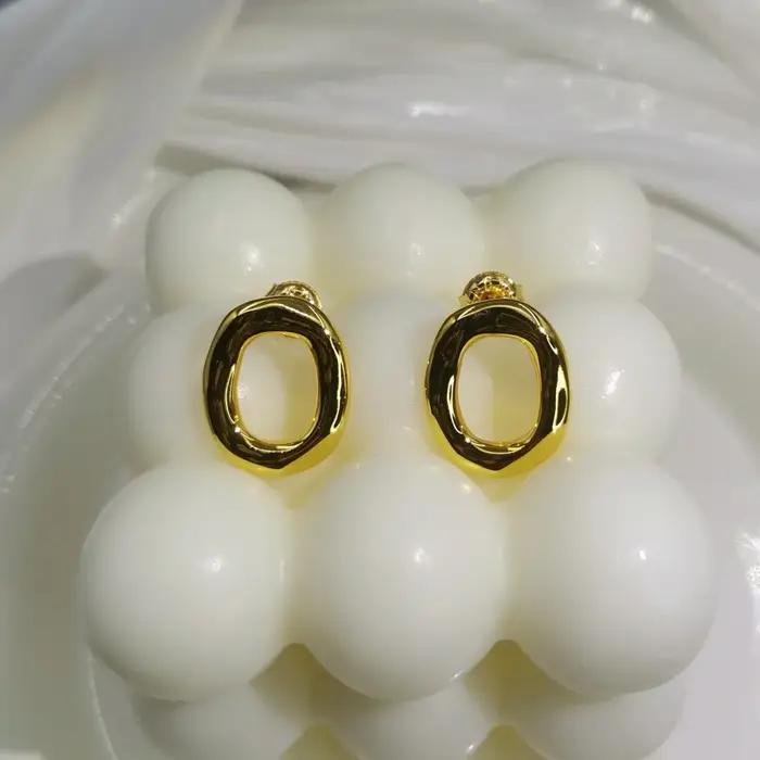 Boucles d'oreilles à anneau creux en or et argent