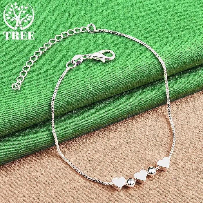 Bracelets en or 18 carats avec petites perles en forme de cœur pour femme