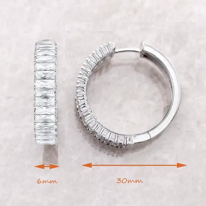 Boucles d'oreilles créoles à charnière avec pierres blanches pavées