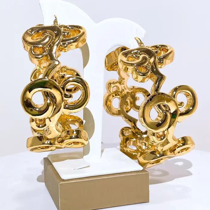 Boucles d'oreilles créoles Yulaili nigérianes plaquées or