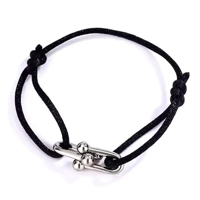 Bracelet tressé réglable en corde avec fermoir en U en forme de fer à cheval