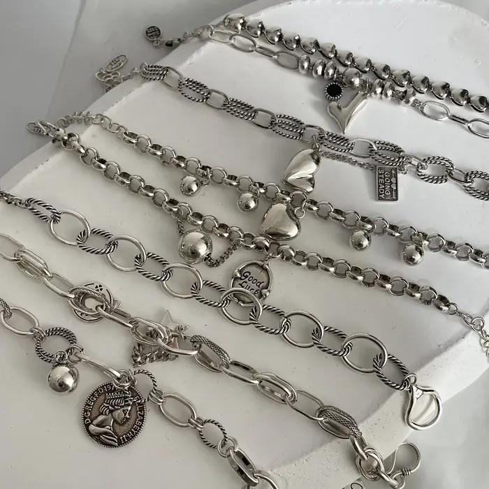 Bracelet en métal en argent regardé 100% pour femme