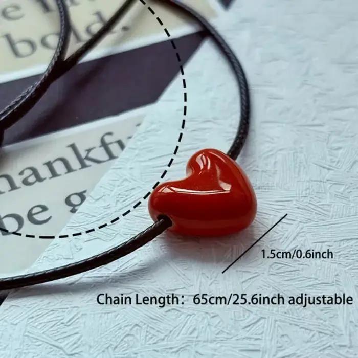 Collier en céramique forme de cœur avec cordon tressé noir ras du cou élégant pour femmes occasions spéciales
