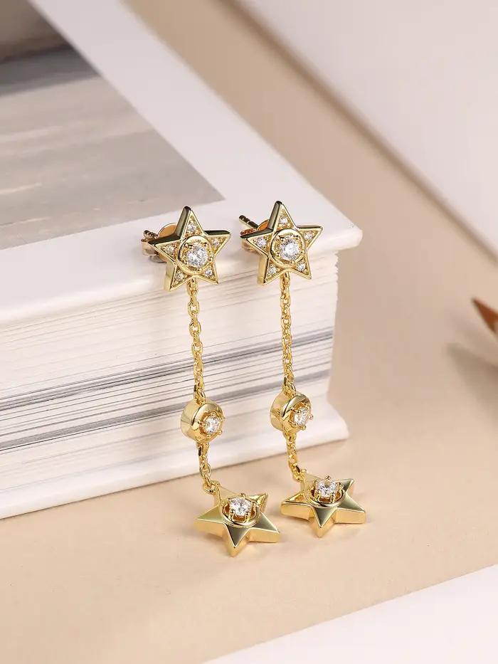 Boucles d'oreilles pendantes longues avec pompon étoile pour femme