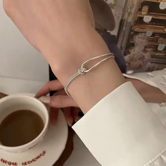 Bracelet en argent sterling 925 avec nœuds entrelacés pour femmes et filles, style vintage minimaliste, chaîne réglable, bijou de fête, cadeau