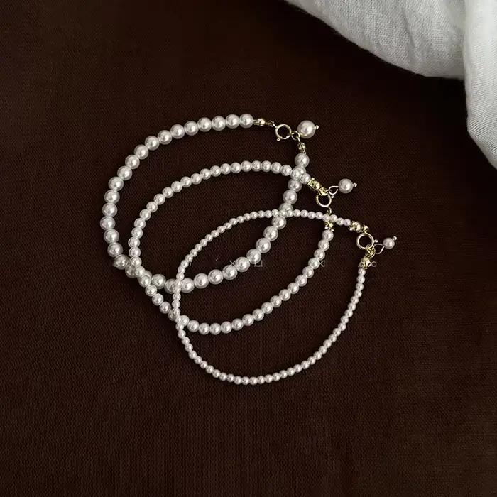 Bracelet à breloques en perles dorées style mignon romantique pour femmes occassions spéciales soirée party accessorise minimaliste élégant