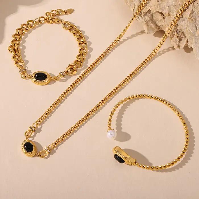 Ensemble de bijoux en acier inoxydable Nobel pour femmes avec pendentif en perle noire ovale plaquée or de luxe pour soirées et occasions spéciales