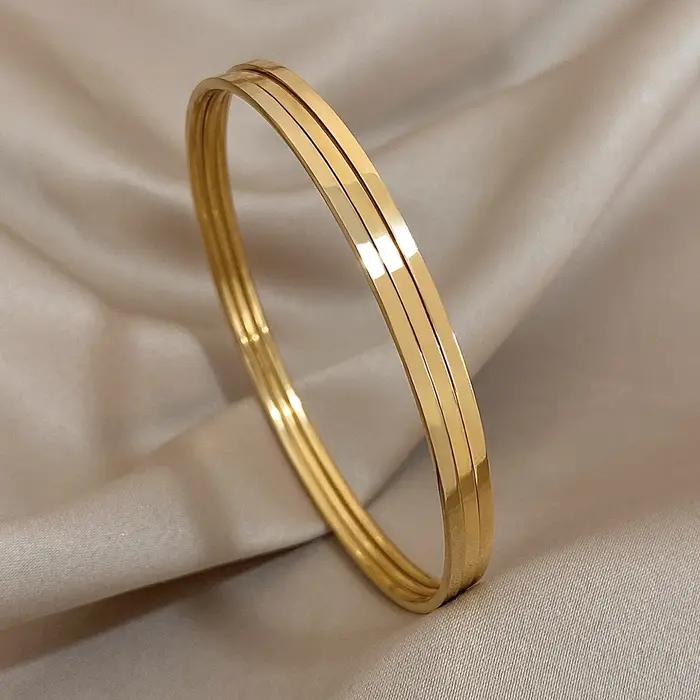 Bracelet en acier inoxydable plaqué or brillant 18 carats pour femmes