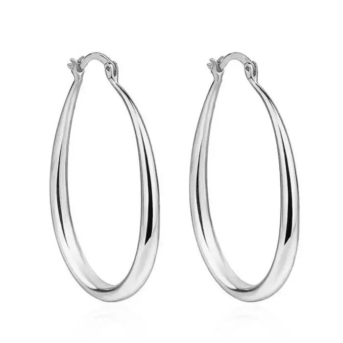 Boucles d'oreilles créoles lisses en or brillant pour femmes